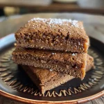 Close-up of a slice of Vegan Russischer Zupfkuchen showing its rich, chocolatey layers and creamy texture.